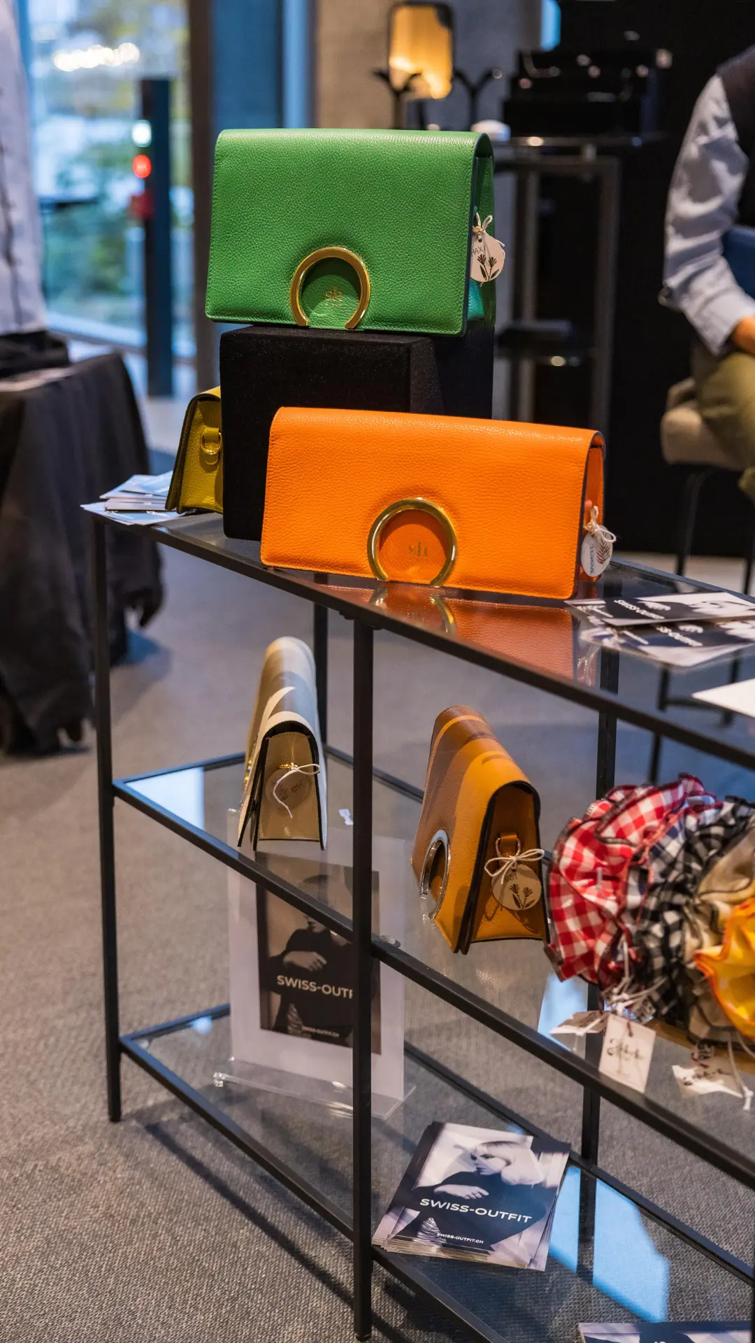 Curated luxury exhibition of handcrafted leather goods on display at Couture Fashion Night
