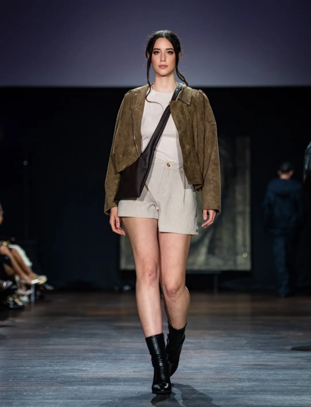 Model in a suede jacket, shorts and black boots by Mejor Francisco
